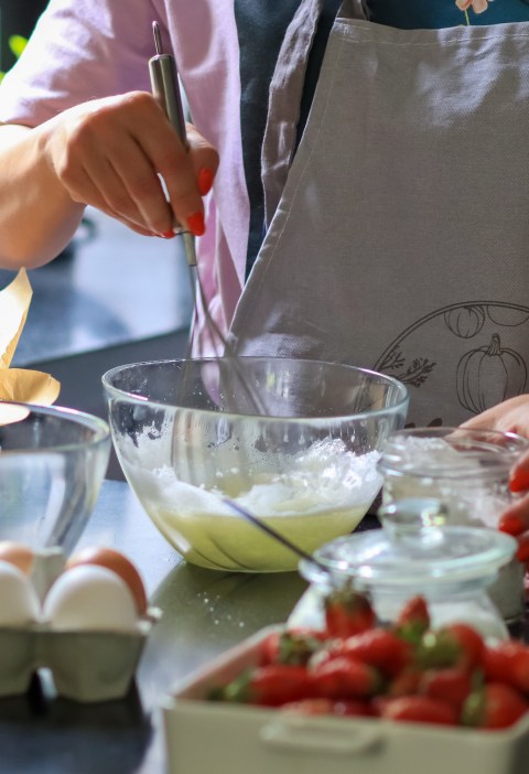 baking-at-home-kitchen-preparaing-cake-young-wo