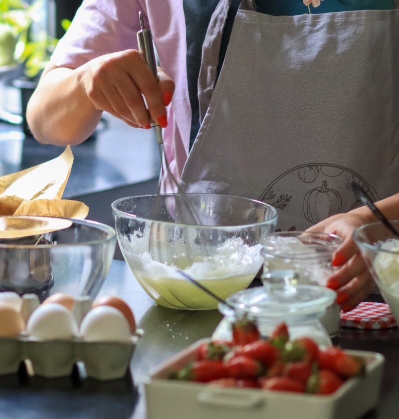 baking-at-home-kitchen-preparaing-cake-young-wo